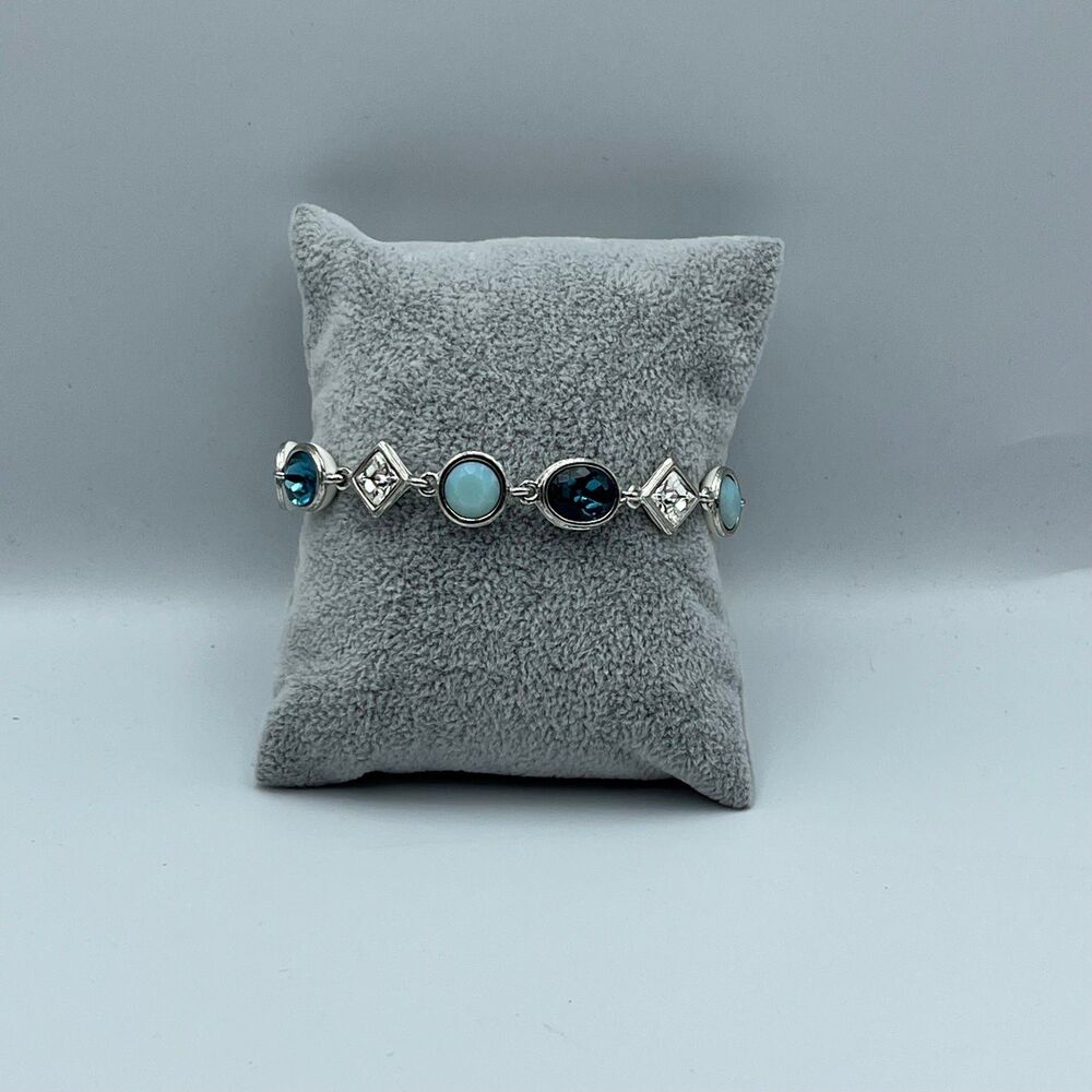 Nolan miller blue glass and white silver tone bracelet